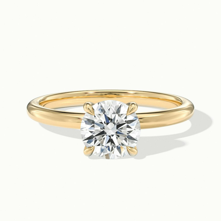 Jany 1.5 Carat Round Cut Solitaire Moissanite Diamond Ring in 10k Yellow Gold