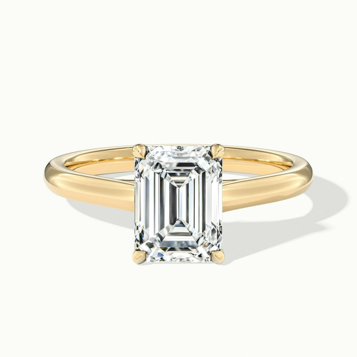 Ira 1.5 Carat Emerald Cut Solitaire Moissanite Engagement Ring in 10k Yellow Gold